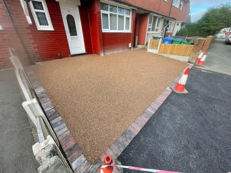 Resin by S P Groundworks & Driveways - Golden resin drive with clay block border